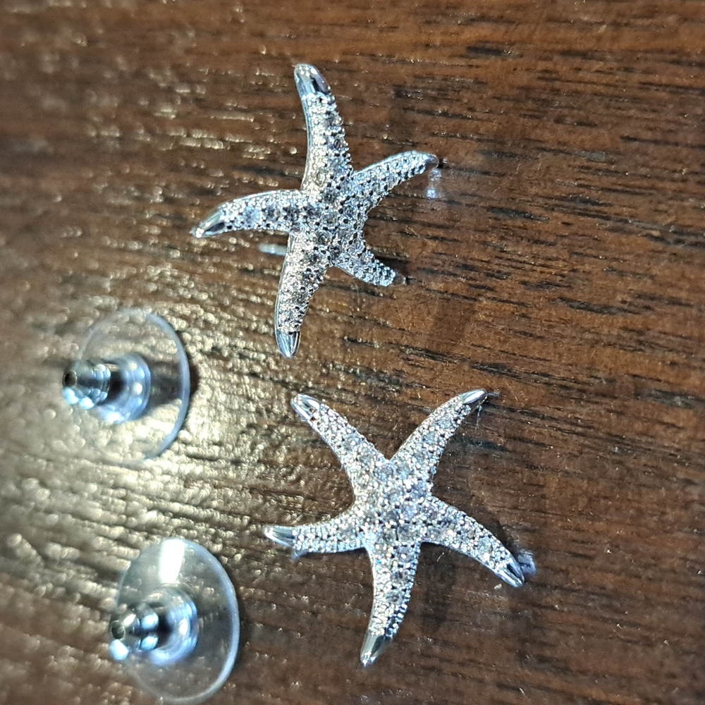 Silver Mini Starfish Pierced Earrings By Amanda Blue cubic zirconia.